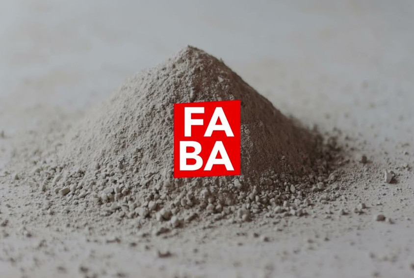Logo del FABA amb una muntanya de terra de fons